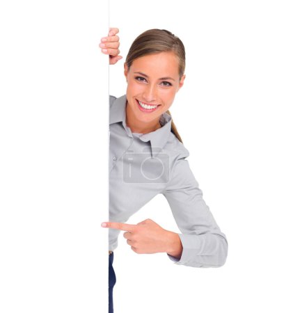 Photo for Pointing, portrait and a woman with a poster for branding isolated on a white background in a studio. Mockup, happy and a brand ambassador with a gesture to signage space for an announcement. - Royalty Free Image