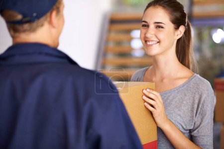 Photo for Delivery, shipping and courier with woman at door for logistics, cargo and supply chain. Ecommerce, package and export with man giving customer box at home for distribution, freight and retail. - Royalty Free Image