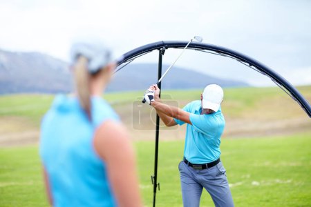 Photo for Ring, drive or beginner golfer in golf course lesson for fitness, workout or exercise to learn to swing. Coaching, golfing or male athlete training with instructor for driving with a club stroke. - Royalty Free Image