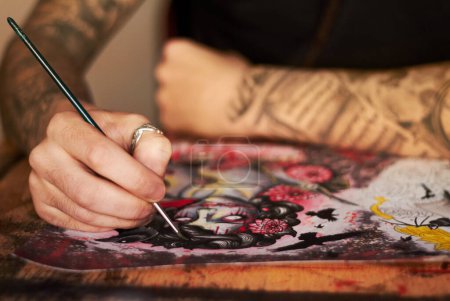 Photo for Art, paint and creative with a woman tattoo artist closeup in a studio to design a piece of artwork. Hand, canvas and a female painter using color ink while painting a picture closeup for expression. - Royalty Free Image