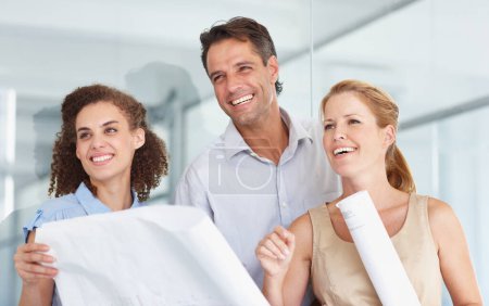 Photo for Happy business people, blueprint and construction planning in meeting for collaboration at the office. Group or architect team smiling with document, paperwork or floor plan for architecture project. - Royalty Free Image