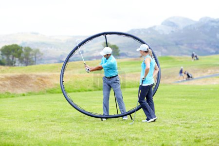 Photo for Ring, sports woman or golfer in golf course lesson for fitness, workout or exercise with a swing on field. Coaching, golfing game or athlete training with instructor for driving with a club stroke. - Royalty Free Image