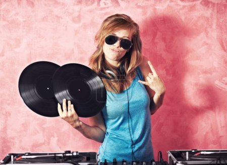 Photo for DJ woman, mixer and portrait with vinyl records, sunglasses and horns sign at club, studio or party. Girl, music director and party with rock icon, turntable or attitude for event, celebration or job. - Royalty Free Image