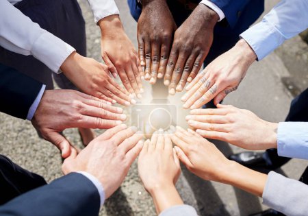 Photo for Hands, teamwork or top view of business people outside in collaboration for mission goals in city. Light, link or employees meeting with strategy, teamwork or support outdoors together in huddle. - Royalty Free Image