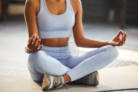 Photo for Meditation, yoga and hands of woman in gym for wellness, mindfulness and breathing exercise on floor. Mental health, meditate and female person in lotus pose for calm, zen and balance in fitness. - Royalty Free Image