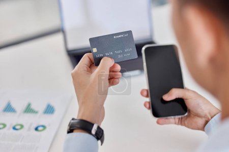 Photo for Businessman, hands and phone with credit card for online shopping, banking or finance at office. Hand of man employee or shopper with debit and smartphone for bank payment or ecommerce at workplace. - Royalty Free Image