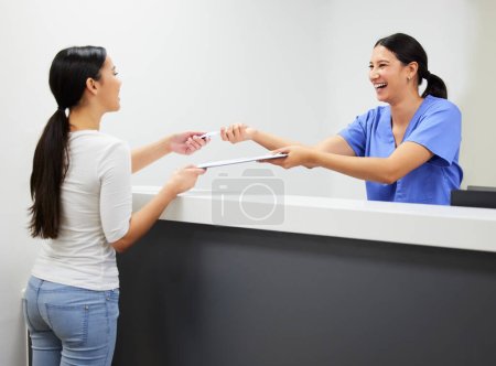 Photo for Documents, reception and a nurse helping a patient in the hospital during an appointment or checkup. Application form, happy and a woman medical assistant at a health clinic for check in or sign up. - Royalty Free Image