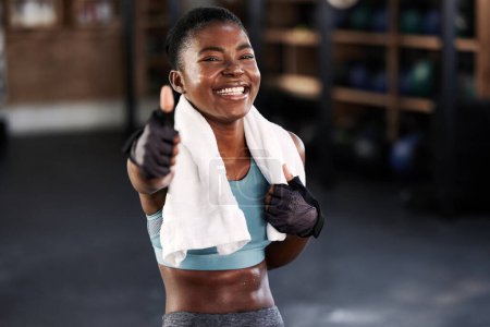 Photo for Gym, portrait or happy black woman with thumbs up in fitness training with positive mindset or motivation. Encouragement, workout or excited personal trainer with like hand sign, support or thumb up. - Royalty Free Image