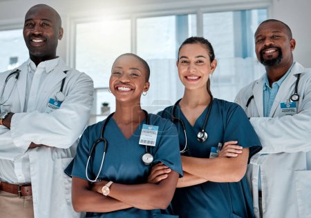Photo for Group, doctors and portrait with arms crossed, smile and hospital teamwork with solidarity, women and men. Doctor, team and people with happiness, medical collaboration and healthcare in clinic job. - Royalty Free Image