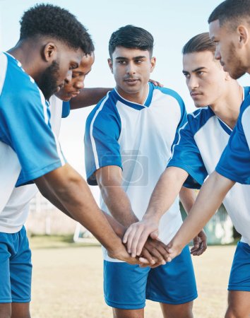 Photo for Soccer, sports group or team with hands together on field for fitness training or competition. Football player, club and diversity athlete men together for scrum, game motivation or teamwork outdoor. - Royalty Free Image