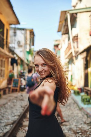 Photo for I love everything about traveling. a beautiful young woman exploring a foreign city - Royalty Free Image