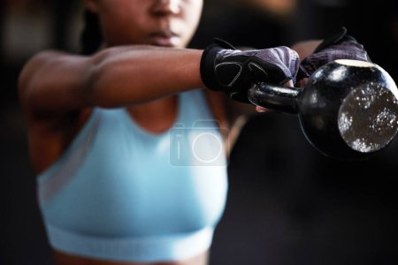 Photo for Hands, kettlebell or strong woman in fitness training, workout or bodybuilding exercise for grip strength power. Body builder, blurry closeup or female sports athlete at gym lifting heavy weights. - Royalty Free Image