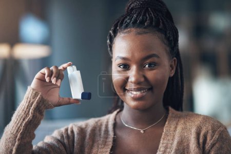 Photo for Asthma, medicine and portrait of a woman with inhaler to breathe in home for health and wellness. Happy black person with pharmaceutical product for healthcare, lungs or chest and respiratory problem. - Royalty Free Image