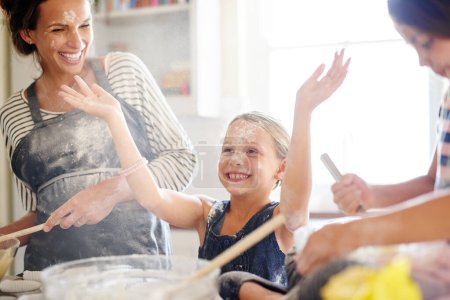 Photo for Family, girls and mother baking, kitchen and excited with love, child development and bonding. Mama, female children and kids with ingredients, fun and playful with quality time, home and daughters. - Royalty Free Image