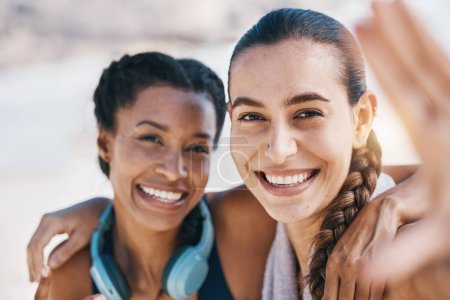 Photo for Women friends, beach selfie and smile in portrait for adventure, fitness and hug with fitness in nature. Latino girl, black woman and photography for profile picture, social network and blog update. - Royalty Free Image