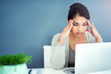 Photo for Business woman, headache and pain with laptop, office and hands for mistake, anxiety or stress at startup. Young businesswoman, burnout and pain with fatigue, frustrated and glitch on pc in workplace. - Royalty Free Image
