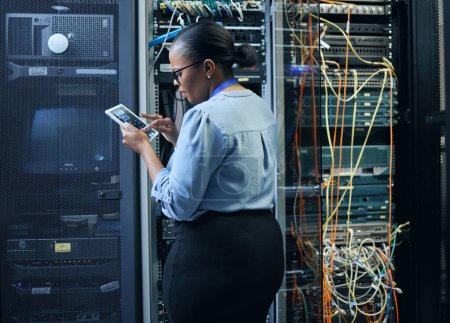 Photo for Server room, woman and engineer with tablet for cybersecurity, programming or cable maintenance. Black female technician in datacenter for network, software or system upgrade with IT app and internet. - Royalty Free Image