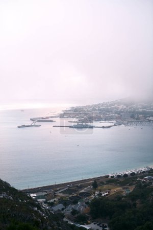 Photo for A typical coastal city. a busy coastal village on a mountain side during the day - Royalty Free Image