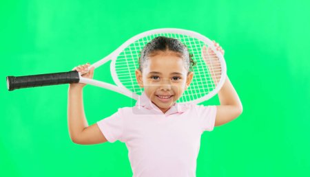 Photo for Children, tennis and a girl on a green screen background in studio for sports, recreation or fun. Portrait, kids and fitness with an adorable little female child or athlete on chromakey mockup. - Royalty Free Image