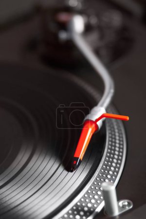 Photo for Closeup, turntable and vinyl for music system, professional dj job and needle for sound, party and vintage audio gear. Zoom, retro record player and disc for scratch, spinning and club for listening. - Royalty Free Image