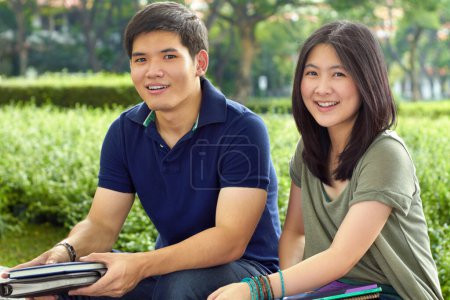 Photo for Students, education and portrait of friends in college for learning, scholarship or knowledge. University, study and future with Asian man and woman on campus for back to school, motivation and youth. - Royalty Free Image