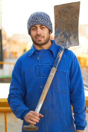 Photo for Portrait, shovel and a man construction worker on a building site for manual labor on a development project. Industrial, builder and maintenance with a professional engineer or contractor outdoor. - Royalty Free Image