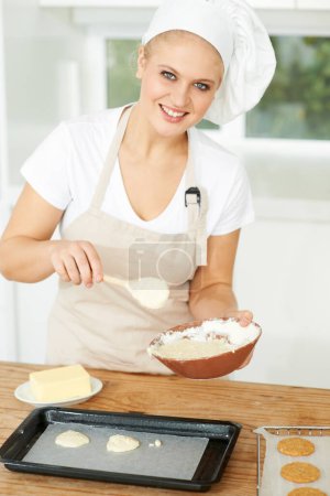 Photo for Happy woman, portrait or chef baking cookies with dough or pastry in a bakery kitchen with recipe. Food business, dessert tray or girl baker working in preparation of a sweet meal, cake or biscuit. - Royalty Free Image
