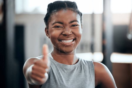 Photo for Fitness, portrait or happy black woman with thumbs up in gym training with positive mindset or motivation. Wellness, smile or healthy personal trainer in workout with a like hand gesture for support. - Royalty Free Image