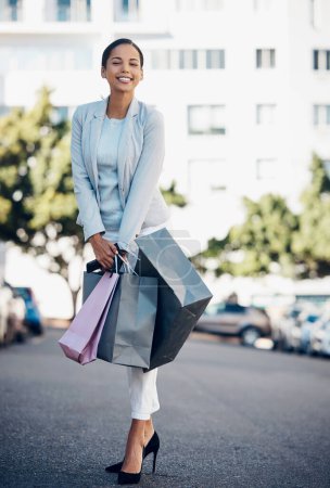 Photo for Happy woman, portrait and shopping bag in city street for fashion, style or purchase in the outdoors. Female person or shopper with smile for luxury spree on road in stylish clothing in an urban town. - Royalty Free Image