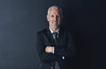 Photo for Arms crossed, happy and portrait of business man in studio for professional, corporate or manager. Boss, pride and confidence with face of male ceo on black background for executive and mockup space. - Royalty Free Image