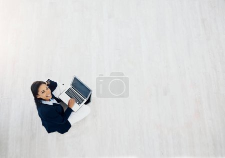 Photo for Laptop, floor and business woman planning, copywriting and online social media in startup career and mockup. Portrait, website and professional writer, editor or person on computer for research above. - Royalty Free Image