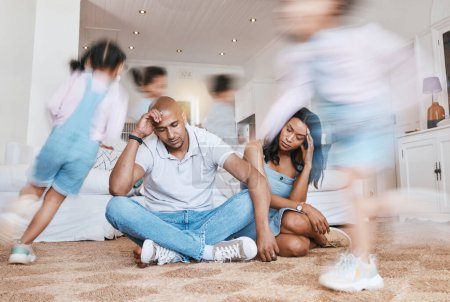 Photo for Running, home and parents with stress, kids and tired with burnout, anxiety and noise in a living room. Mother, father and energetic children in a lounge, adhd and fatigue with motion and headache. - Royalty Free Image