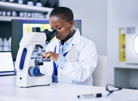 Photo for Scientist, black woman and microscope, analysis and science study with medical research and biotechnology in lab. Female person, doctor and pathology, check test sample with scientific experiment. - Royalty Free Image