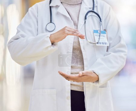 Photo for Hospital, doctor and hands of woman in circle for wellness, medical service and insurance in clinic. Healthcare, mockup and closeup of female health worker with hand shape for consulting innovation. - Royalty Free Image