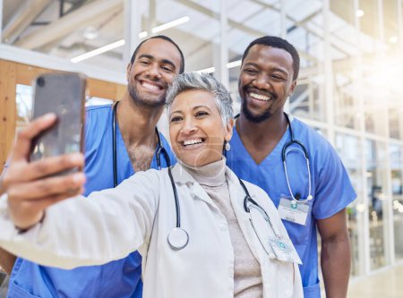 Photo for Memory, selfie and medical staff with collaboration, career and social media in a hospital, smile or cheerful. Doctors, nurse or group with connection, healthcare professional or teamwork with memory. - Royalty Free Image