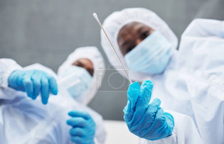 Photo for Science, csi and evidence with people during a medical investigation closeup from below as a team. Collaboration, analysis and forensic with professional samples at a crime scene to collect a sample. - Royalty Free Image