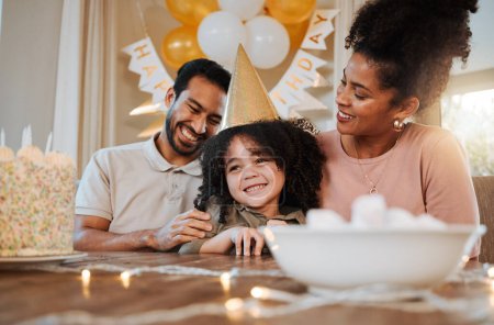 Photo for Birthday, party and parents with cake for child in living room for event, celebration and social gathering. Happy family, surprise and kid with dessert, snacks and sweet treats with presents at home. - Royalty Free Image