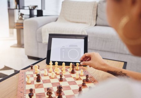 Photo for Video call, chess and woman with tablet, mockup and screen in gaming connection in living room. Thinking, internet and chessboard, virtual strategy board game and African girl problem solving in home. - Royalty Free Image