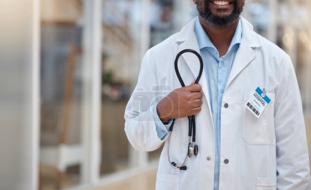 Photo for Hospital, doctor and hands of black man with stethoscope for cardiology, consulting and medical service. Healthcare, clinic and closeup of male health worker with equipment for support, exam and help. - Royalty Free Image