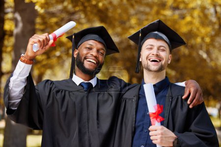 Photo for Graduation, men and portrait of friends celebrate achievement, education goals and smile for success outdoor. Happy male university students, graduate celebration and pride for certificate of freedom. - Royalty Free Image