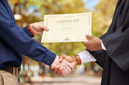 Photo for Shaking hands, graduation and certificate for college student with congratulations, professor and event for learning. Education, celebration and party with diploma, paperwork and award with success. - Royalty Free Image