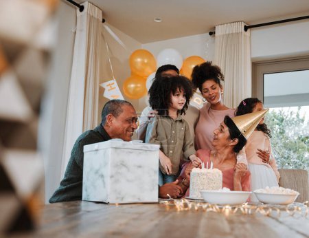 Photo for Grandparents, parents and children with cake at birthday for event, celebration and social gathering. Happy family, surprise and kids with mom and dad for dessert, snacks and gifts in living room. - Royalty Free Image