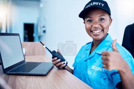 Photo for Security guard, thumbs up and police use a walkie talkie or radio for an emergency or criminal investigation. Protection, safety and officer talking in a law enforcement service office for crime. - Royalty Free Image