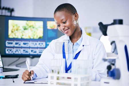 Photo for Writing, biotechnology and scientist woman in laboratory research, plants analysis and test results in natural medicine. Pharmaceutical data, medical and science notes of african person and weed tube. - Royalty Free Image