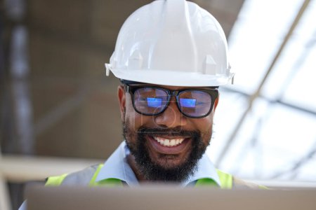 Photo for Architecture, planning and laptop with black man on construction site for engineering, building and design. Technology, research and digital with face of contractor for project management and graphic. - Royalty Free Image