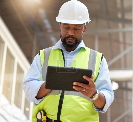 Tablet, engineering man and construction worker for online project management, building progress and floor plan. African person in architecture design on digital tech, renovation or industry software.