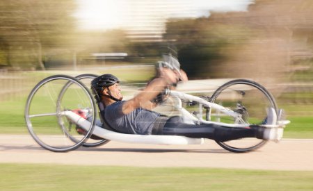 Photo for Cycling, speed and man with disability in race training for competition with action, motivation and exercise on bike. Energy, workout and person on recumbent bicycle on fast outdoor track challenge - Royalty Free Image