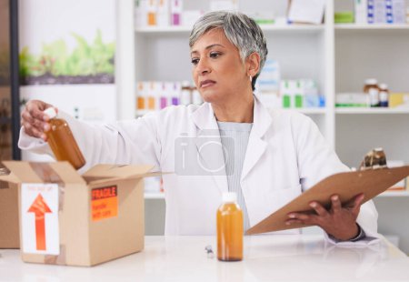 Photo for Woman, doctor and box at pharmacy for inventory inspection, logistics or delivery at drug store. Senior female person, medical or healthcare professional checking pharmaceutical stock or medication. - Royalty Free Image