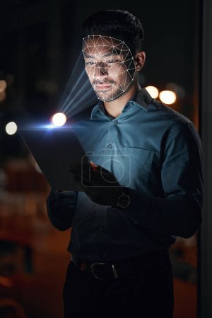 Photo for Asian man, tablet and facial recognition at night in biometrics for access, verification or identification at office. Businessman working late with technology and scanning face for cyber security. - Royalty Free Image