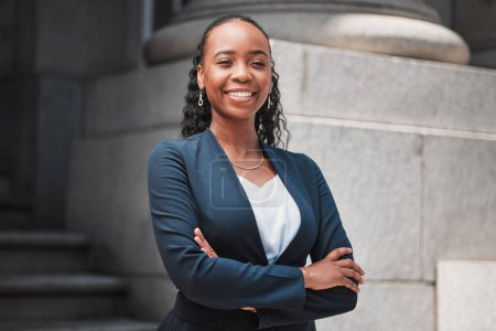 Photo for Arms crossed, attorney or portrait of happy black woman with smile or confidence working in a law firm. Confidence, empowerment or proud African lawyer with leadership or vision for legal agency. - Royalty Free Image